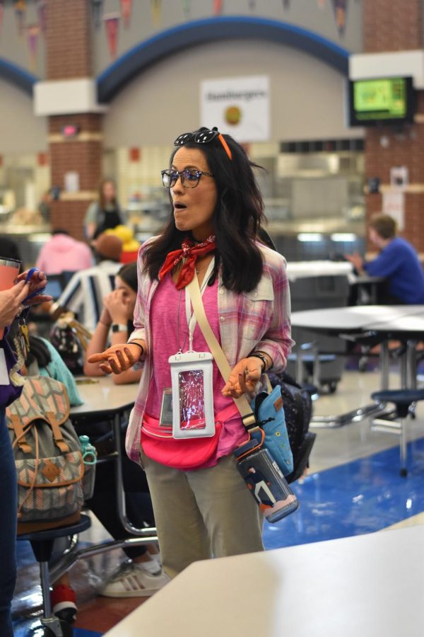 Directions anyone? \\ Embodying her best tacky traveler, Spanish Teacher Mrs. Gricelda Mathis participates in Thursday’s homecoming theme, A Day of Travelling. 
