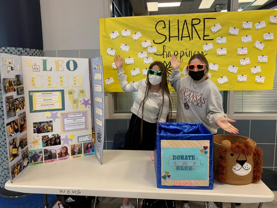 Juniors Avery Farris and Ella Waters volunteer during lunch for the eyeglass drive hosted by the Leo Club. ”I love being a part of Leo Club because I love serving and volunteering to help people in need, Farris said.