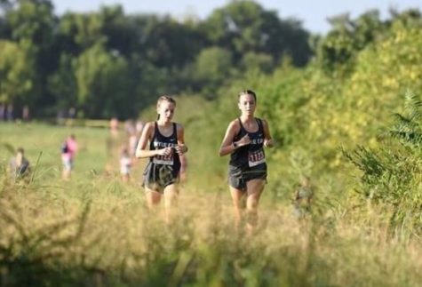 Running mates \\ Sisters Faith Seddig and Evy Seddig both run cross country. “It’s really fun to have a partner to do everything with, but also stressful because you want to beat her,” Evy said.
