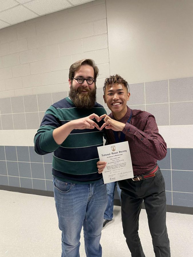 Best buds \\ Junior Aidan Nguyen poses with his dual credit US History teacher, Mr. Jack Garner, after the NHS Induction ceremony Nov. 15. “The most difficult part about dual credit is managing your own time because you’re on your own for the most part when it comes to dealing with assignments,” Nguyen said. 
