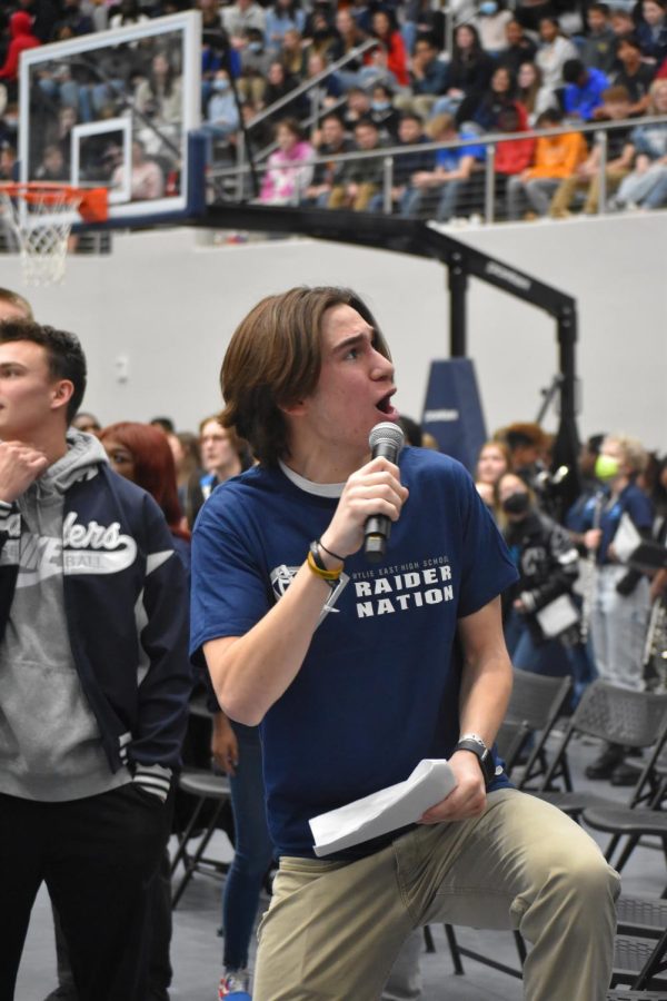 School spirit \\ Senior Everett Vasquez sings the senior chant with his grade at the pep rally Feb. 25 “I love hosting the pep rallies. I find it so enjoyable, but next time, I hope I can remember the words to the senior chant,” Vasquez said.