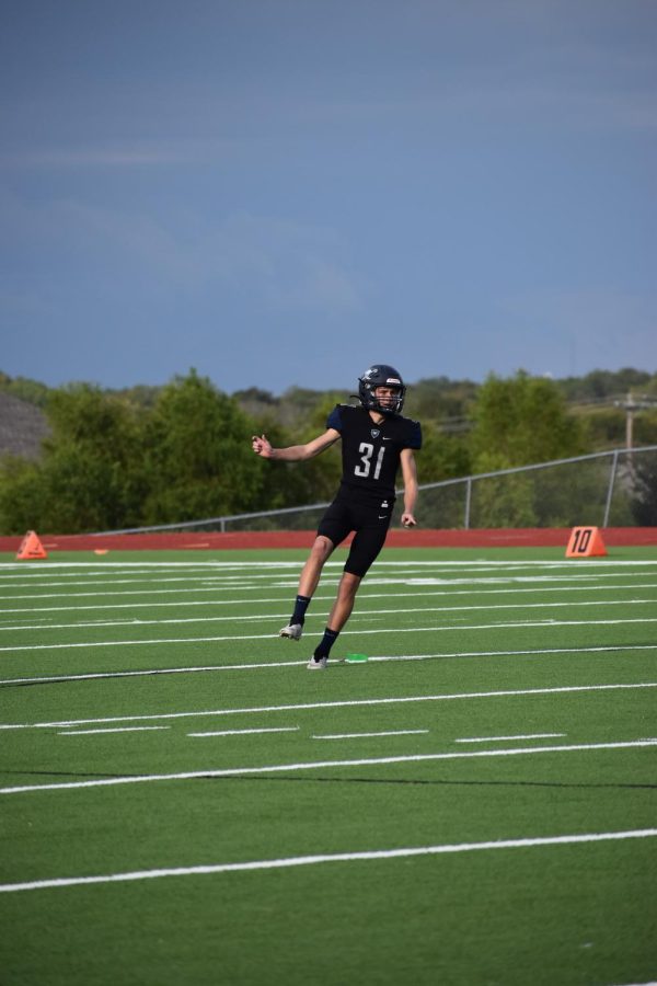 4th period:
Making plays, sophomore Hayden Wren punts the football during fourth period athletics. “I really enjoy playing football because I am also in soccer, so getting to be kicker for the football team was so fun,” Wren said.  
