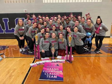 Win the day \\ After competing and performing all day, the Sapphires smile with all the trophies they won at the Crowd Pleasers  competition Feb 19. After all the hours of practice under the direction of Stephanie Jackson, their hard work paid off and the girls were Grand Champions. 