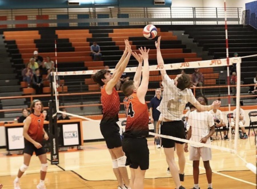 Hit hard \\ Playing in their first match of the season, the new men’s volleyball team plays Rockwall. The team plays their next game against John Paul II March 25.