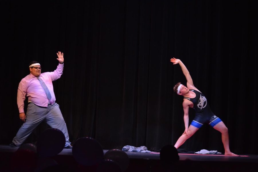 Stretch it out \\ 
Senior Ty Jarvis invited fellow competitor Luis Lopez on stage to teach him yoga during the talent portion of Big Man. I couldn’t be happier to have spent the time preparing with the other big men because they are all such good friends of mine and great people.