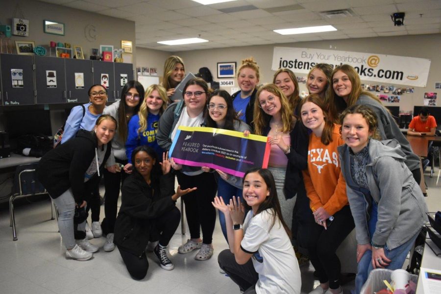 Fruits of labor \\ The yearbook staff celebrates the 2021 yearbook’s recognition in the Jostens’ annual Look Book. The book was selected from among  1,000 and 2,000 books submitted for consideration. “It's great to be featured in the book; I worked hard,” sophomore sports editor Tori Thedford said. “I want everyone to feel that way when seeing themselves in the yearbook.”
