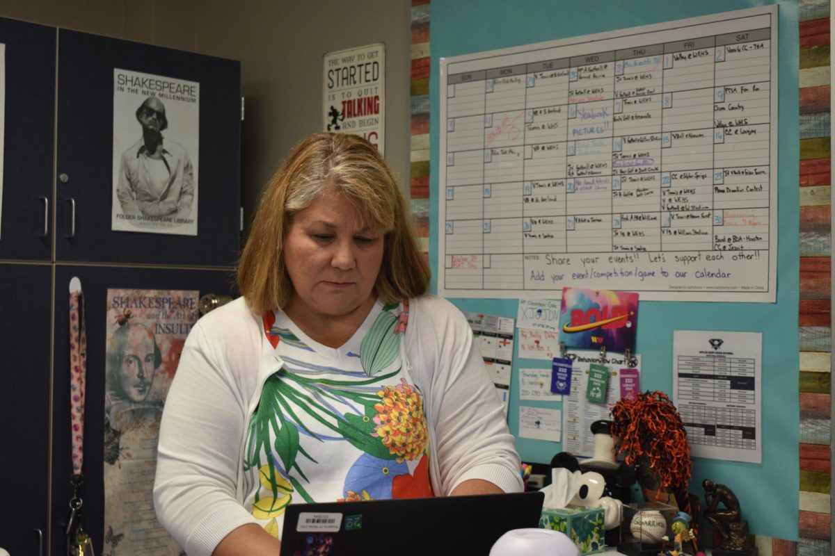 Starting a new chapter \\ Laureen Guarriello responds to emails about assignments to students who dont understand. This is Mrs. Guarriello’s 30th year teaching. She teaches AP language and advanced English I. “I love teaching and helping the students,” Mrs. Guarriello said.