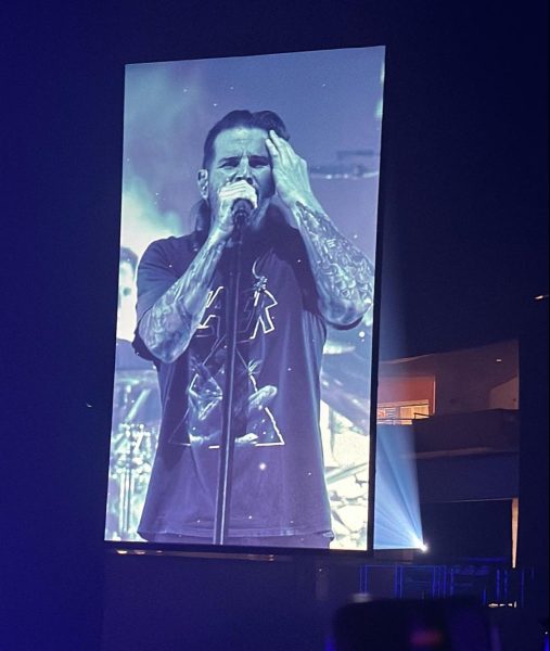 Take the time to listen \\ M. Shadows performs Buried Alive in front of 14,000 people. Buried Alive is one of their popular songs from the album Nightmare, and the song is about people being buried alive under their emotions after bottling them up for ages.