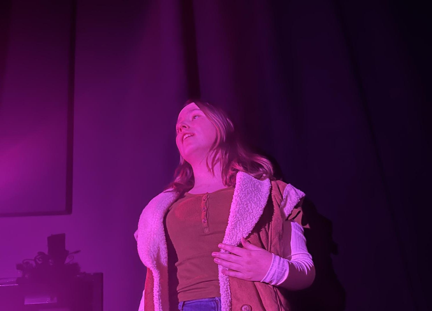 Whodunnit \\ Dramatically monologuing, junior Dahlia Curry, in the character of Belle Dove, implores the audience to believe that she is not the killer of Harry Snotter. “This is definitely my second favorite show that I’ve done, only after Grease.” Curry said. “Both were very fun.”