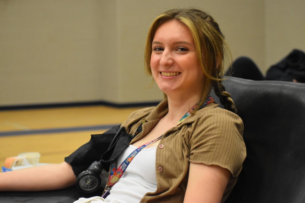 Drawn to you \ Undergoing a phlebotomy, senior Patricia Robinson donates blood during the annual blood drive hosted by the National Honor Society April 18. Donations go to the American Red cross Association in order to provide for those in need. 