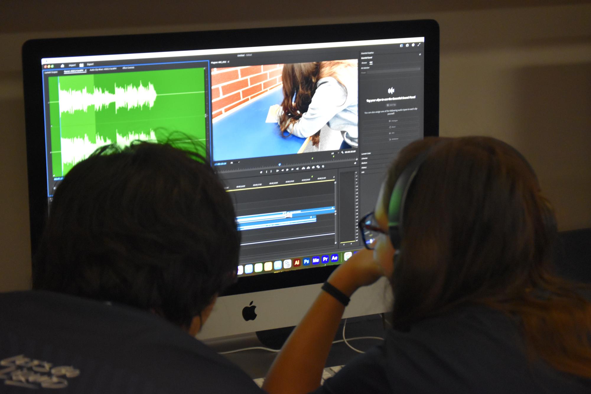 Lights, Camera, Action // Brooklyn Vasquez and David Anderton work together editing their video. They worked on the background audio of their advertisement project. “I like how we can work together to complete our projects,” Vasquez said.
