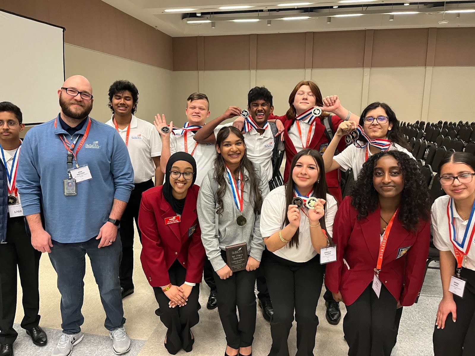 First Place// Skills USA club members pose for a photo at the IT District Competition Competitors in Waco. The club members wore their medals they won during competition. “I competed in web design/development,” junior Hannah Nasir said. “I enjoyed how welcoming everyone was since it was my first year.”