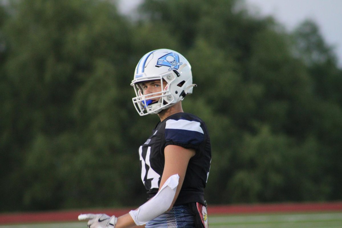 During the football game against Sachse on Oct. 2, sophomore Kaison Moon prepares for a play. Moon has been playing football for five years. “I enjoy football because I get to spend time with my teammates and hit people,” Moon said. Wylie East won 27-7. 